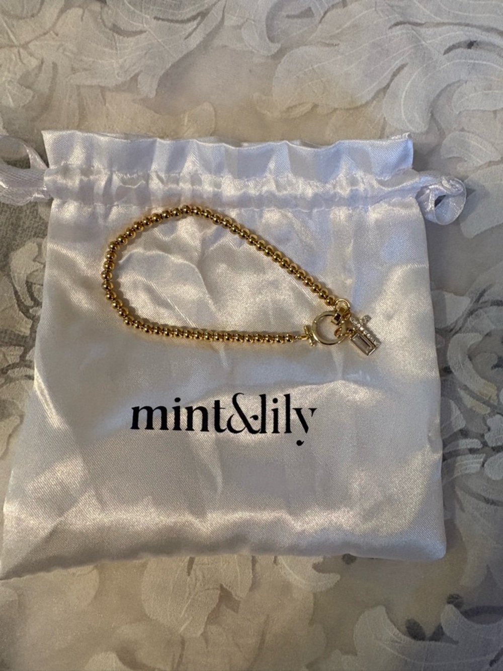 Mint & Lily Gold Beaded Bracelet with Toggle Clasp /Cross/April birthstone